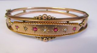 Edwardian 9ct gold hinged bracelet / bangle with diamond and red stone accents and safety chain