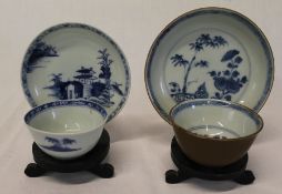 2 Nanking Cargo 18th century Chinese blue and white tea bowls and saucers:- pagoda & rockwork