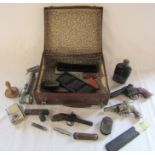 Small vintage suitcase containing various items inc toy pistols - Hubley Police .38 Dandy and