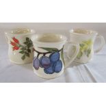 3 Moorcroft mugs (2 second quality) patterns inc rosehip and plum H 8.5 cm