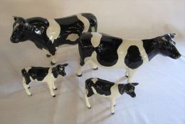 Beswick CH Coddington Hilt bar Friesian bull & CH Claybury Leegwater Friesian cow together with 2