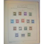 Collection of West Berlin stamps in an Abrix album 1957 to 1982 on printed pages, later issues on