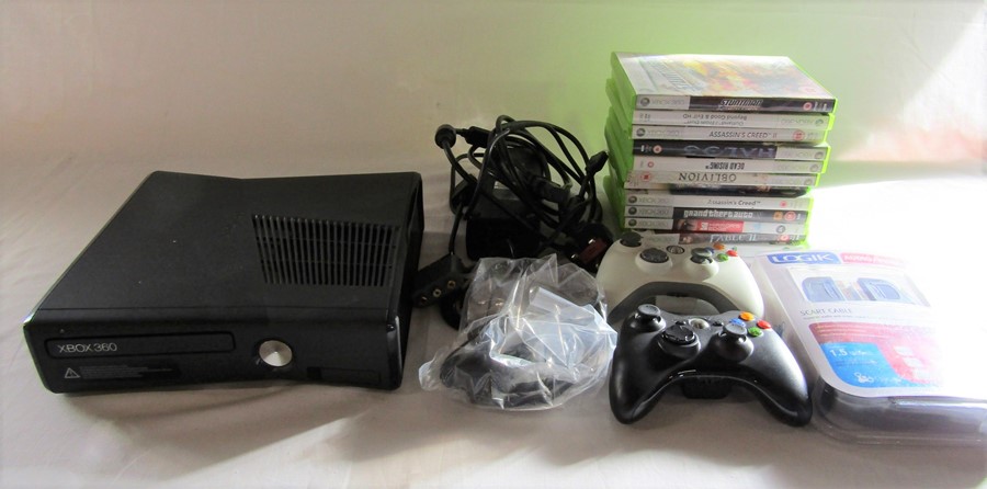Microsoft Xbox 360S gaming console model 1439 with assorted games, headset, scart cable, power