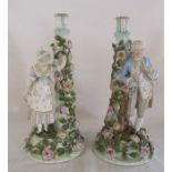 Pair of continental figural candlesticks (one repaired) H 37 cm