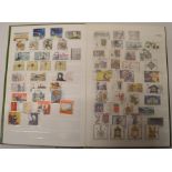 Collection in a green stock book of used unified Germany stamps 1990 to 2005