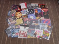 Approximately 100 singles records including Janet Jackson, Sweet, Iron Maiden UB40 etc