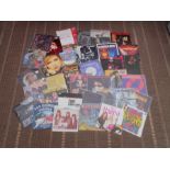 Approximately 100 singles records including Janet Jackson, Sweet, Iron Maiden UB40 etc