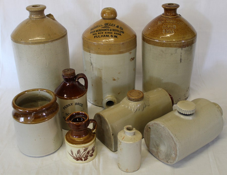 3 stoneware flagons inc. W N Mason Alford, 2 hotwater bottles etc.