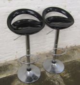Pair of black and stainless steel bar stools