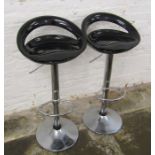 Pair of black and stainless steel bar stools