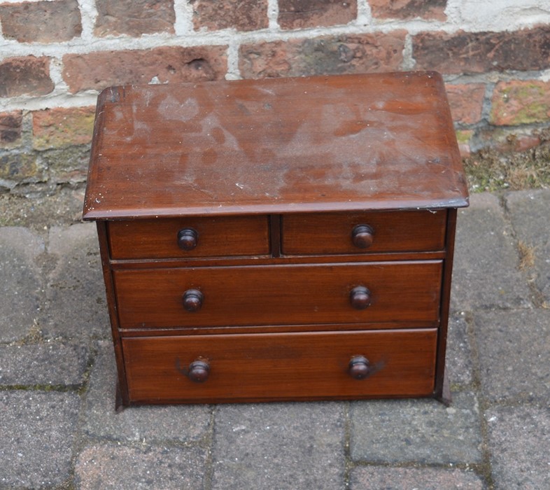 Miniature mahogany chest of drawers (missing piece to base)