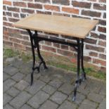 Cast iron and wood table