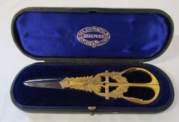 Presentation / Ceremonial cased set of ornate brass handled scissors with fish design and