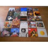 Approximately 60 LP records including The Doors, Iron Maiden, Neil Young, Bob Dylan, The Beach Boys,