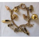 9ct gold charm bracelet with 9ct gold and yellow metal charms total weight 26.5 g