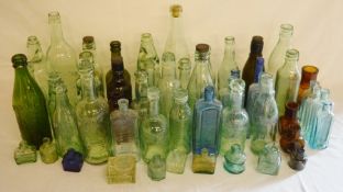 Large collection of 19th/20th century glass bottles including a number of Lincolnshire