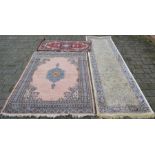 Ivory ground cashmere runner 300cm by 78cm, red ground rug 186cm by 125cm & a small red rug