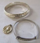 Silver ornate bangle, christening bangle and St Christopher total weight 0.77 ozt