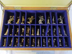 Cased Franklin Mint 'Tournament of Camelot' limited edition pewter chess set electroplated with 0.