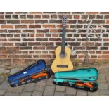 2 junior violins, music stand and guitar