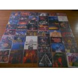 Approximately 80 heavy metal LP records including Iron Maiden, Rainbow, Motorhead, Samson, AC DC