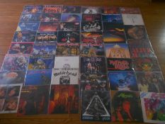 Approximately 80 heavy metal LP records including Iron Maiden, Rainbow, Motorhead, Samson, AC DC