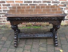 Late 19th /early 20th century heavily carved oak serving table L 106 cm D 62 cm H 76 cm