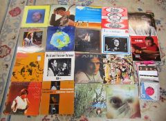 18 33 rpm LPs inc Bob Dylan, The Boomtown Rats, Yes, Ian Dury and Paul Simon & 18 7" singles inc The