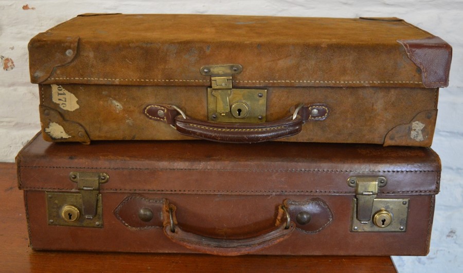 2 old leather suitcases (one suede)