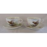 Pair of Royal Worcester 'Grouse' oversized / jumbo cup and saucers with signature from artist Arthur