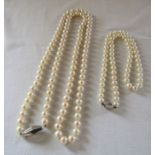 89 cm string of pearls with 14ct gold and diamond clasp & 46 cm string of pearls