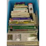 Quantity of therapy books including reflexology, chakra balancing, healing herbs, alternative