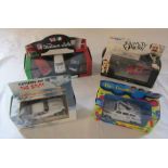 4 boxed Corgi die cast cars - The Beatles, Fawlty Towers, The return of The Saint & The Italian Job