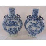 Pair of late 19th/early 20th century blue and white Chinese moon flask vases H 39 cm. Repair to