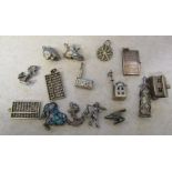 Assorted silver and white metal charms (15) weight 33.7 g / 1.08 ozt