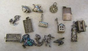 Assorted silver and white metal charms (15) weight 33.7 g / 1.08 ozt