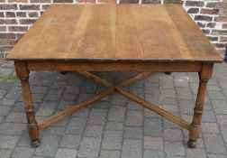 Oak table on turned legs with an X frame stretcher 136cm by 137cm