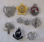 Various foreign Police badges inc Lesotho, Solomon Islands, Singapore & Swaziland