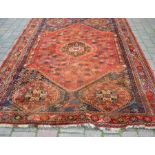 Persian red ground carpet 284 cm by 211 cm (requires cleaning)