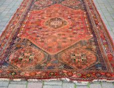 Persian red ground carpet 284 cm by 211 cm (requires cleaning)