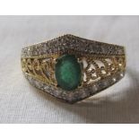 18ct gold diamond and emerald ring size R/S weight 6.9 g (emerald 7 mm x 5 mm)
