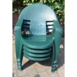 4 green plastic stacking garden chairs