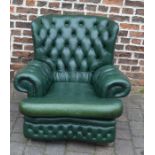 Green leather Chesterfield style button back armchair