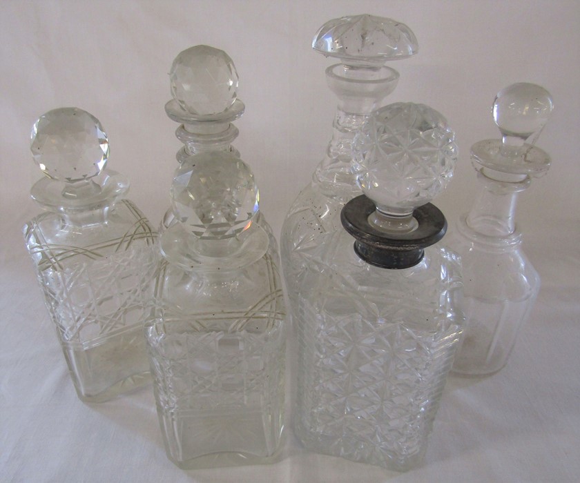 Selection of glass decanters inc one with silver collar