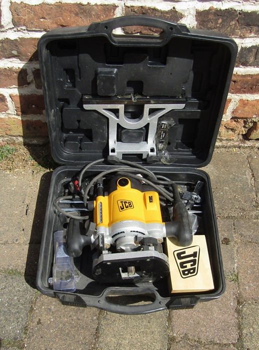 Cased JCB router with tools