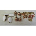 Pair of 10 ct gold ball shaped cufflinks 4 g, 9ct gold and white enamel cufflinks 7.2 g & pair of