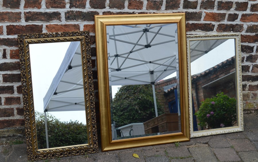 3 gilded wall mirrors (largest 90 cm x 63 cm)