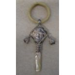 Silver Pied Piper design baby rattle Birmingham 1922 with mother of pearl handle and teething ring L