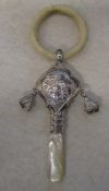 Silver Pied Piper design baby rattle Birmingham 1922 with mother of pearl handle and teething ring L