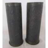 Pair of trench art shell cases with floral embossed decoration H 22.5 cm